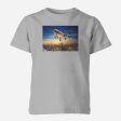 Super Aircraft over City at Sunset Designed Children T-Shirts For Sale